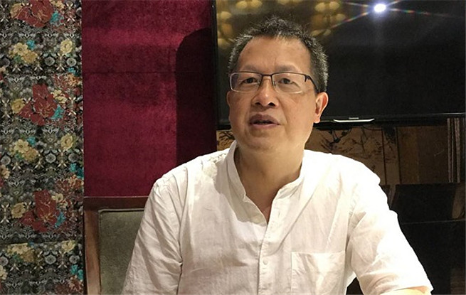 羅偉章《誰在敲門》：每個時代下的人們，骨髓里都敲打著古歌