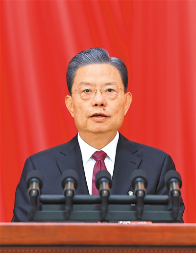 3月8日，十四屆全國人大二次會議在北京人民大會堂舉行第二次全體會議。受全國人大常委會委托，趙樂際委員長向大會報告全國人大常委會工作。 　　新華社記者 王 曄攝