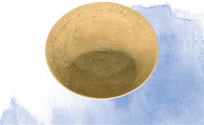 　南宋青釉刻花“吉”字碗。  　　中國國家版本館中央總館供圖